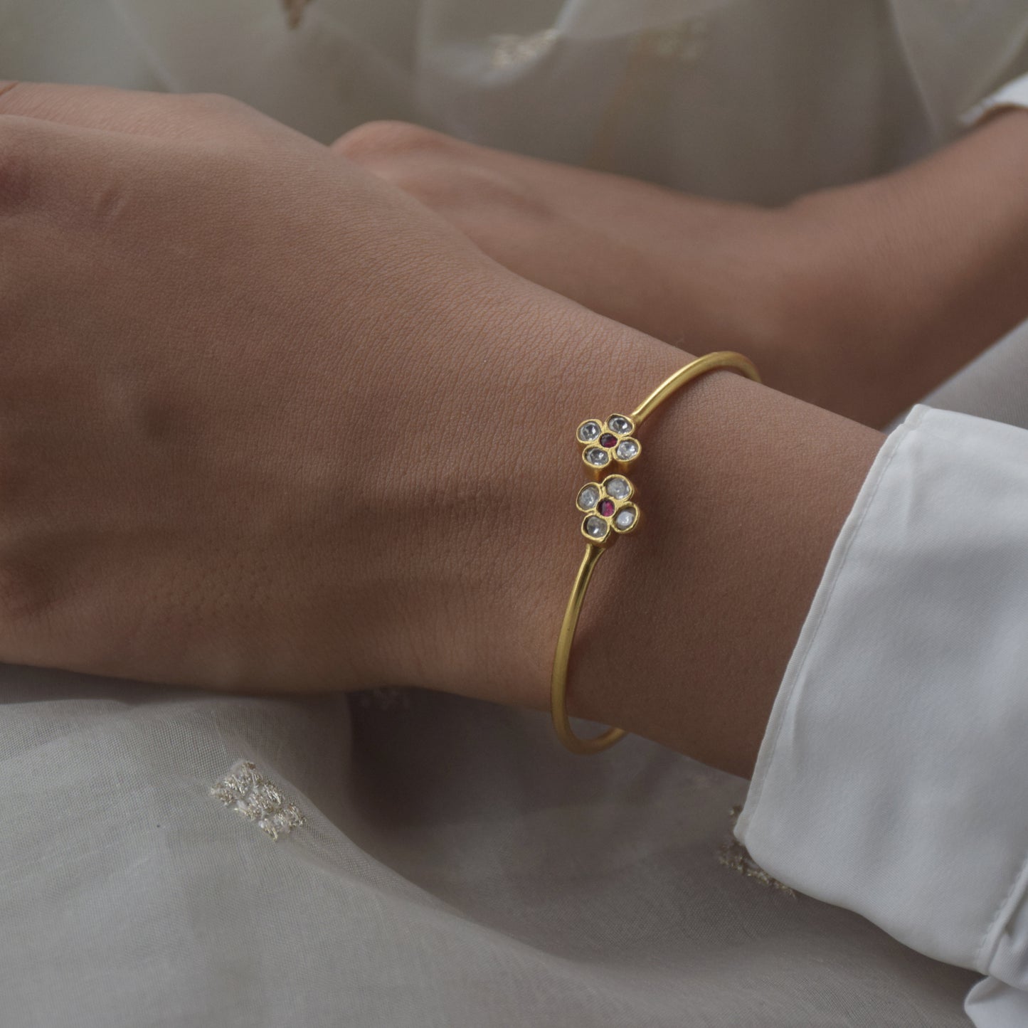 Phool Adjustable Bangle crafted in gold-plated 92.5 silver.
