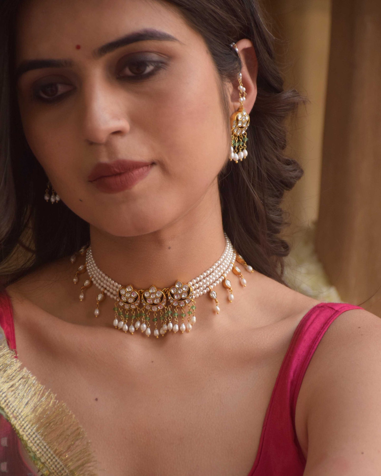 Roop Choker Necklace crafted in 925 silver featuring three classic chaand-phool motifs adorned with hanging rice pearls and green aventurine beads.