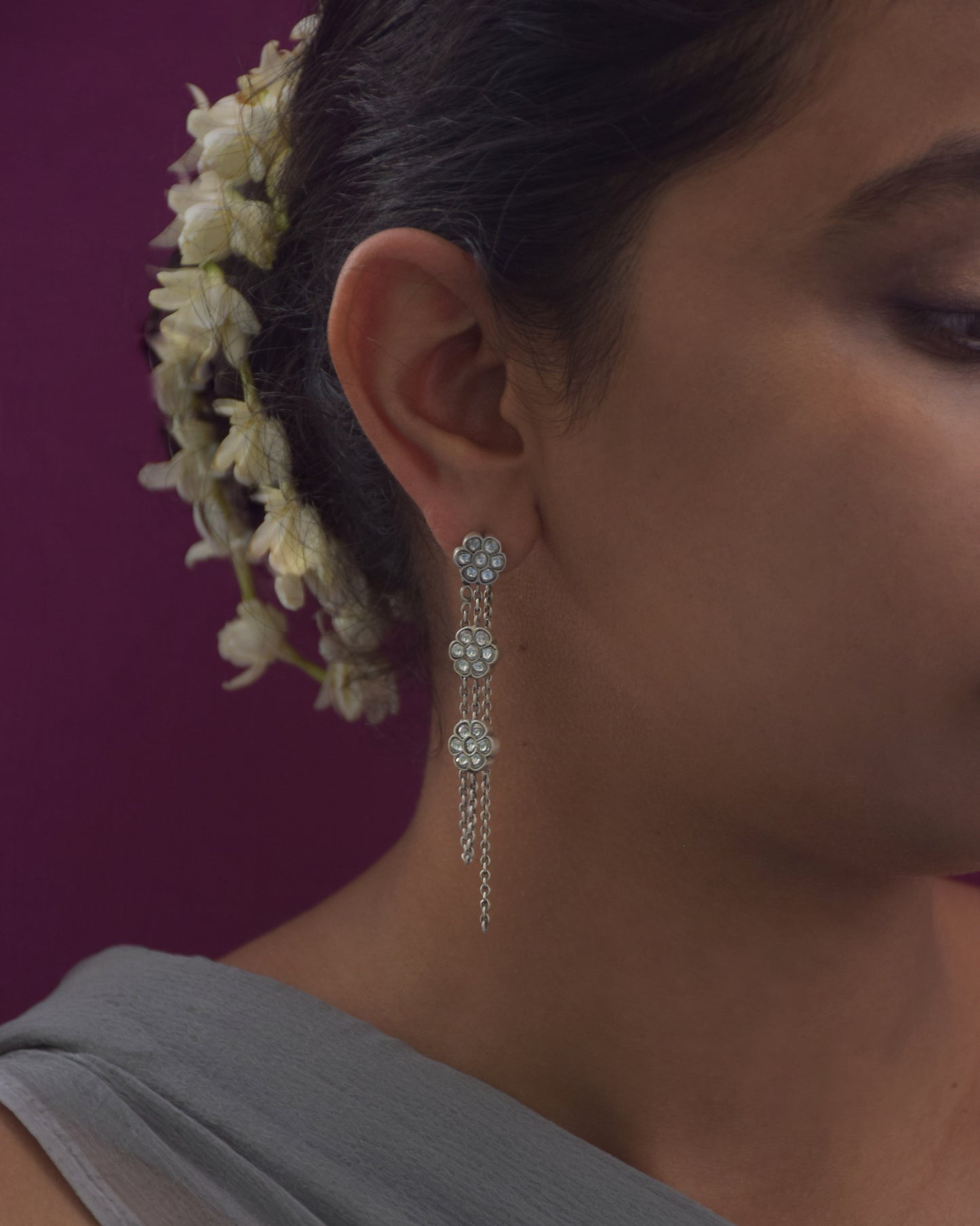 Bela Earrings – Handcrafted 3-way convertible earrings in 92.5 sterling silver, featuring delicate floral jadau motifs connected with elegant silver chains. Wear as kaanchain, danglers, or statement long earrings – perfect for both traditional and modern outfits.