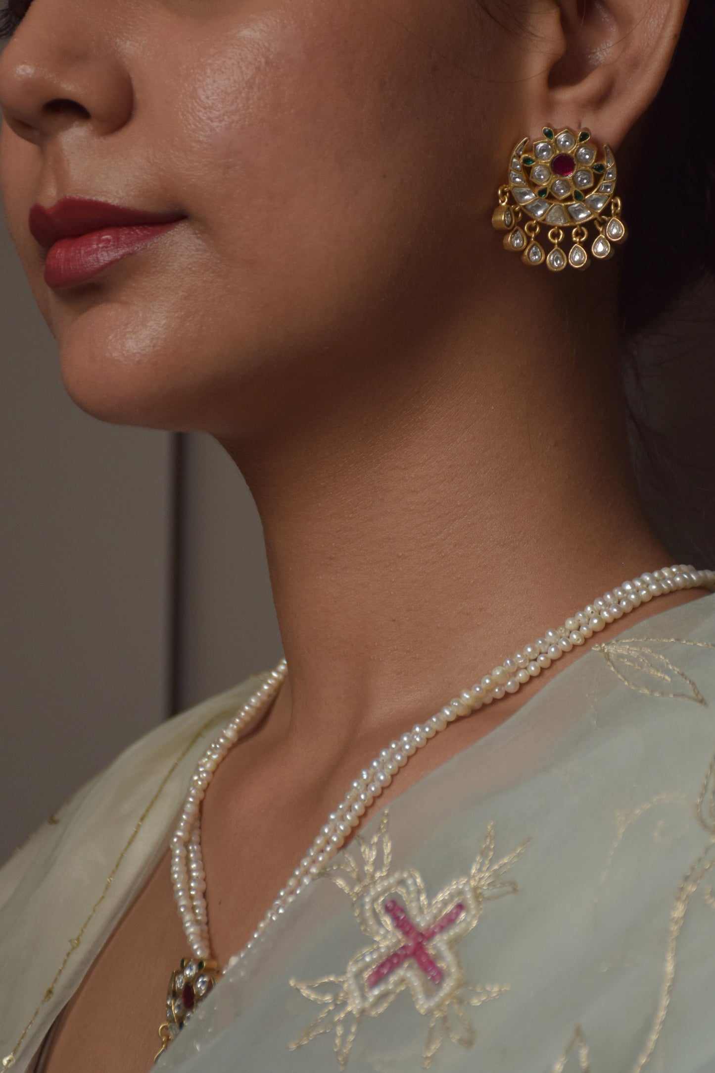 Nuvi Jewels Chand Phool Earstuds, sterling silver with gold polish, featuring delicate Jadau stones, lightweight and elegant for weddings, festivals, or ethnic occasions.