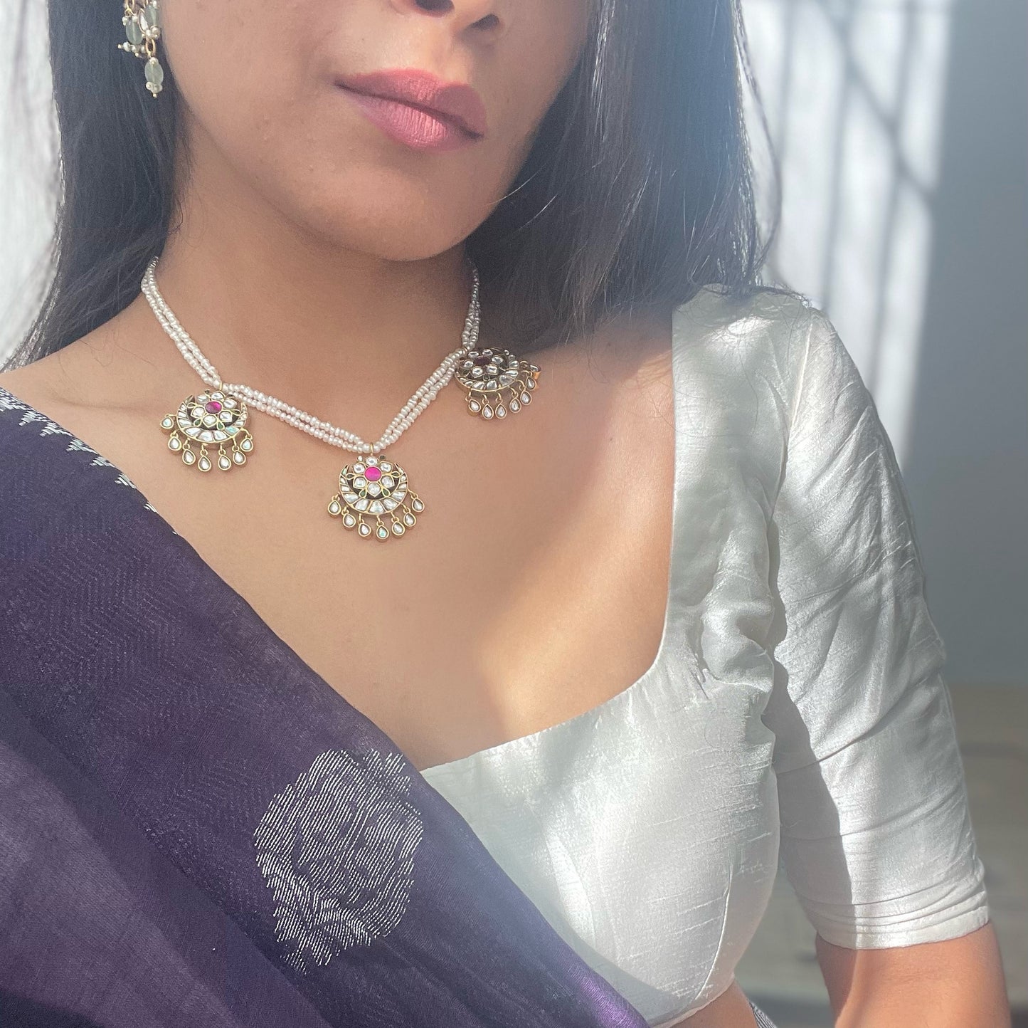 Chand Phool Necklace handcrafted in 925 silver featuring intricate jadau chand units suspended from strings of lustrous freshwater pearls.