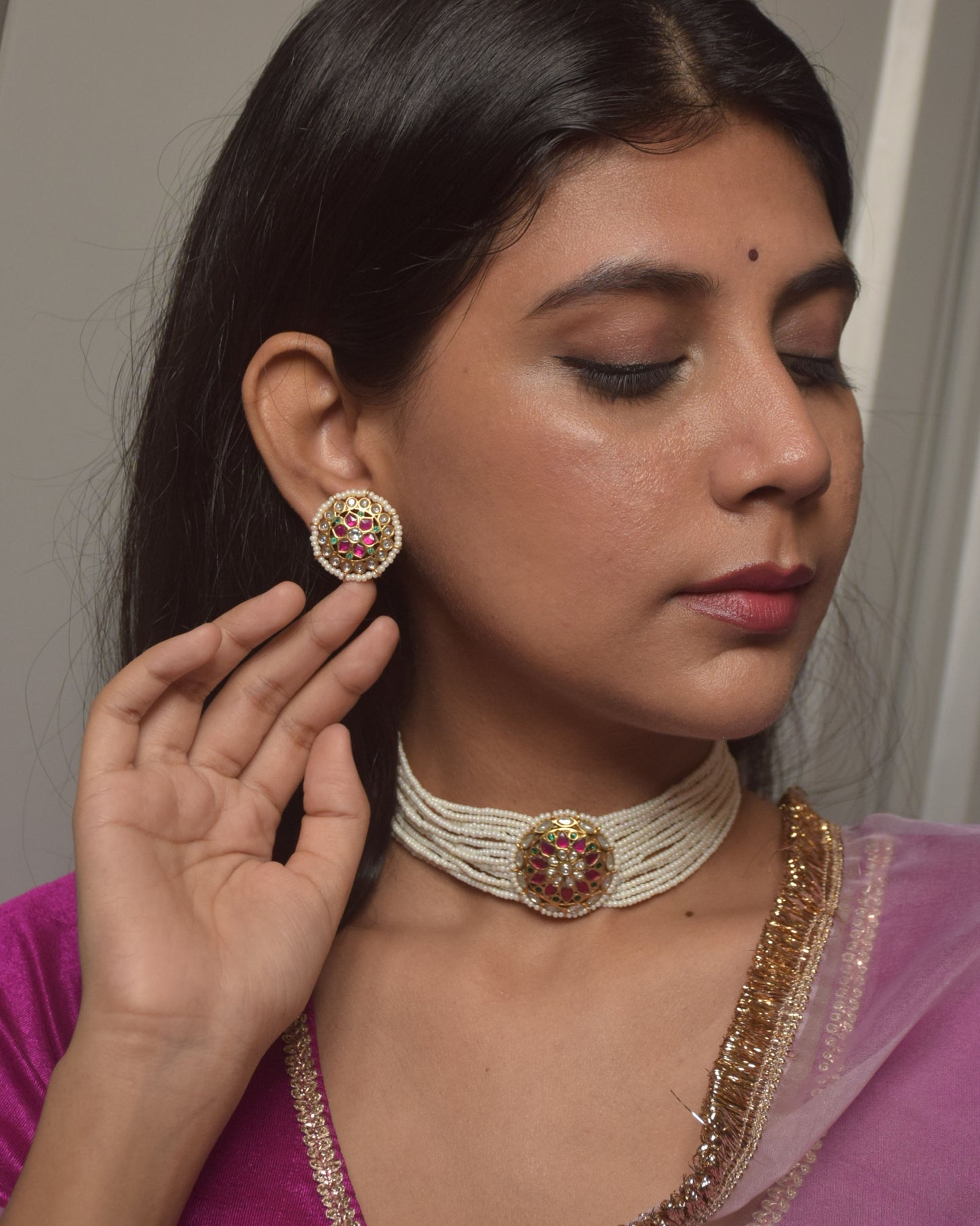 Classic 925 silver ear studs featuring radiant multicolored Jadau stones arranged in an intricate round floral design