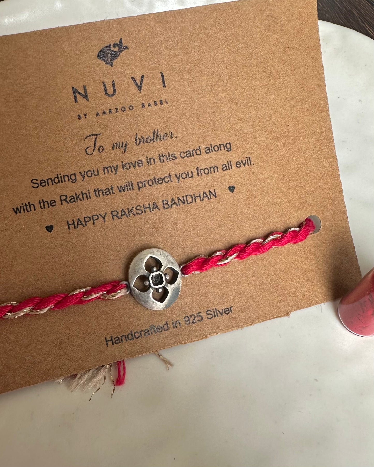 Flower Jali Designer Silver Rakhi – Handcrafted 925 Chandi Rakhi for Brother | NUVI JEWELS