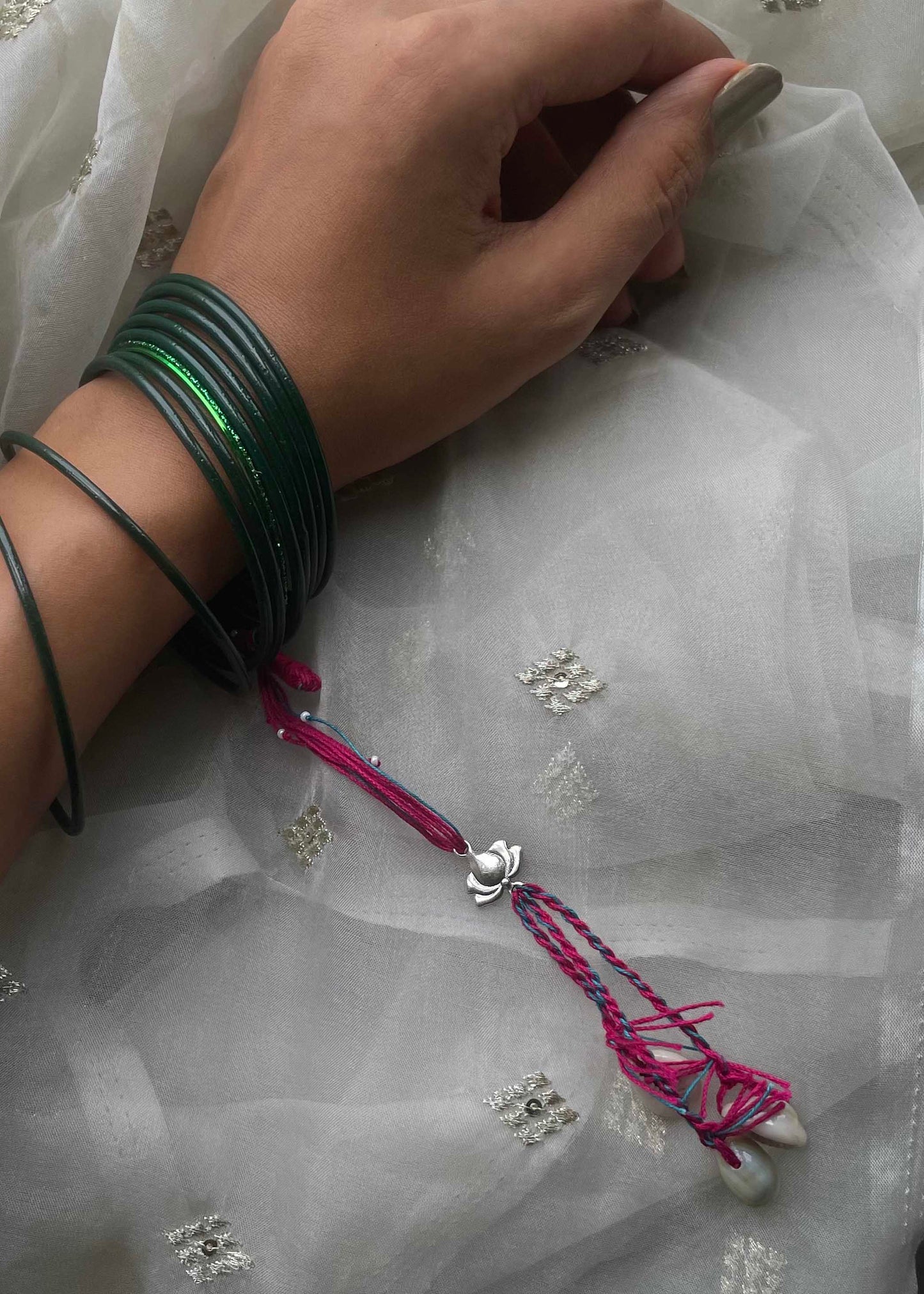 Fine silver lumba rakhi designed for bhabhi with elegant handcrafted artistry