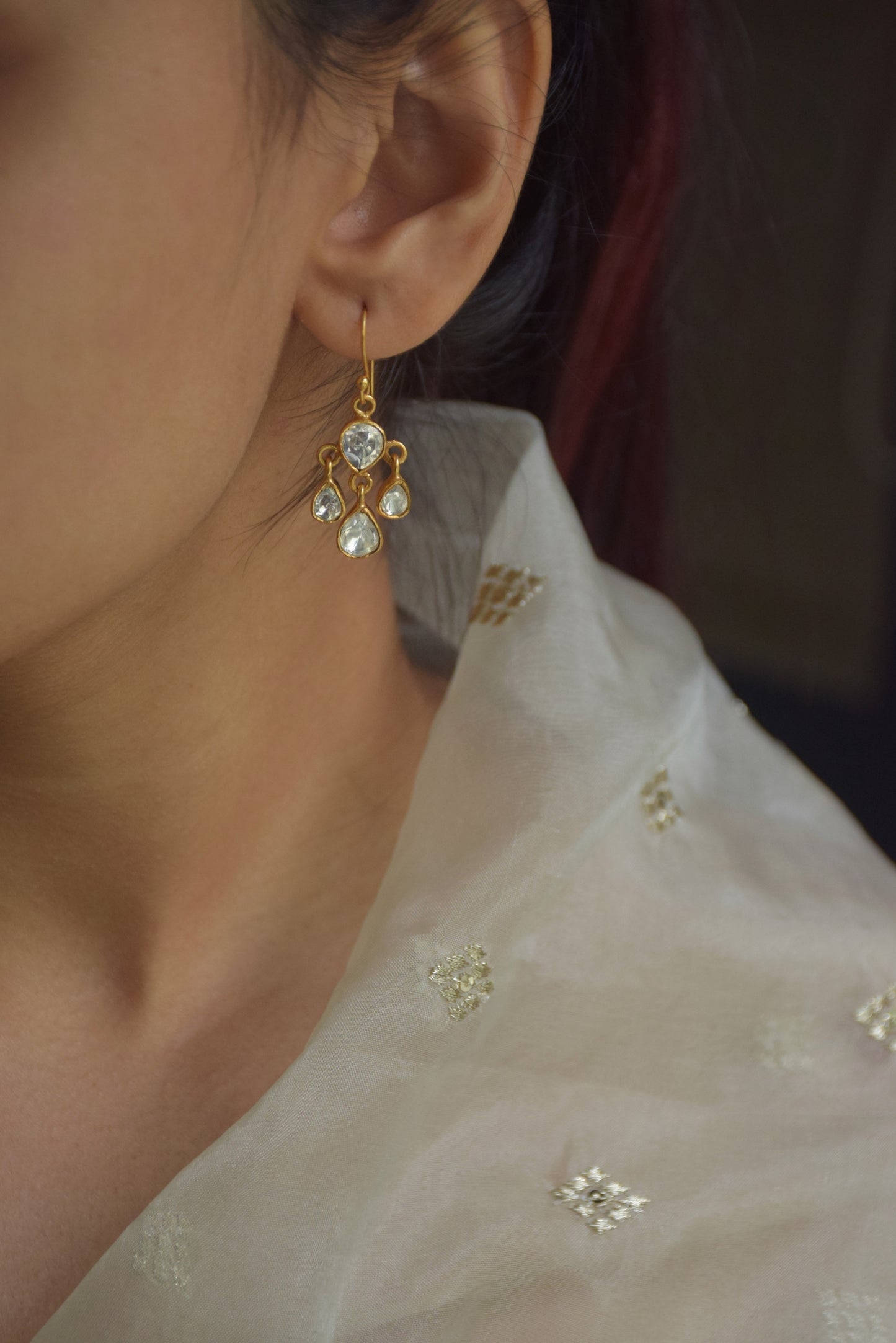 Nargis Fish Hoop Earrings crafted in 925 silver, featuring delicate Polki stone drops in a graceful hoop.