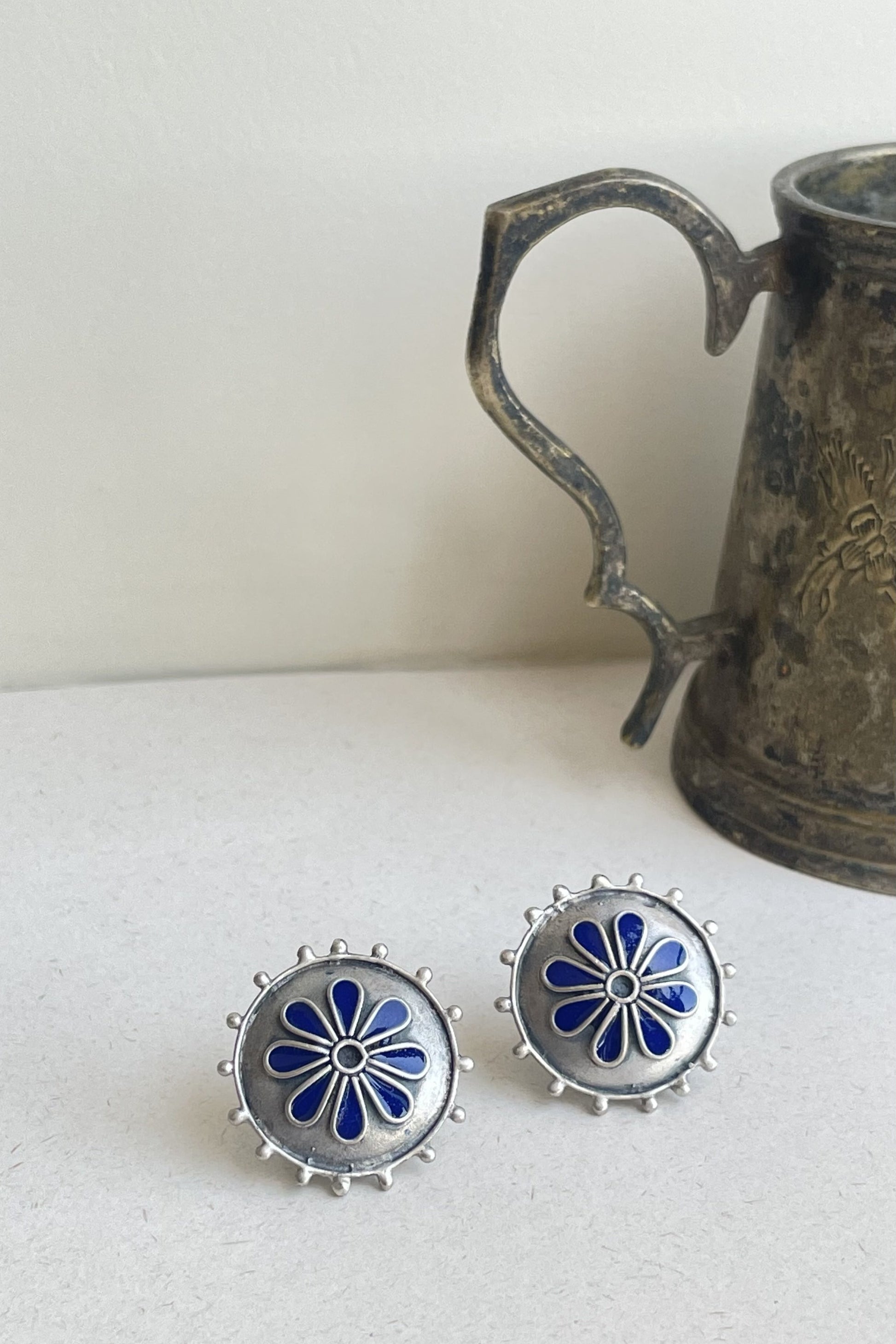 Neel Meena 925 oxidized silver earstuds featuring intricate blue Meenakari work.