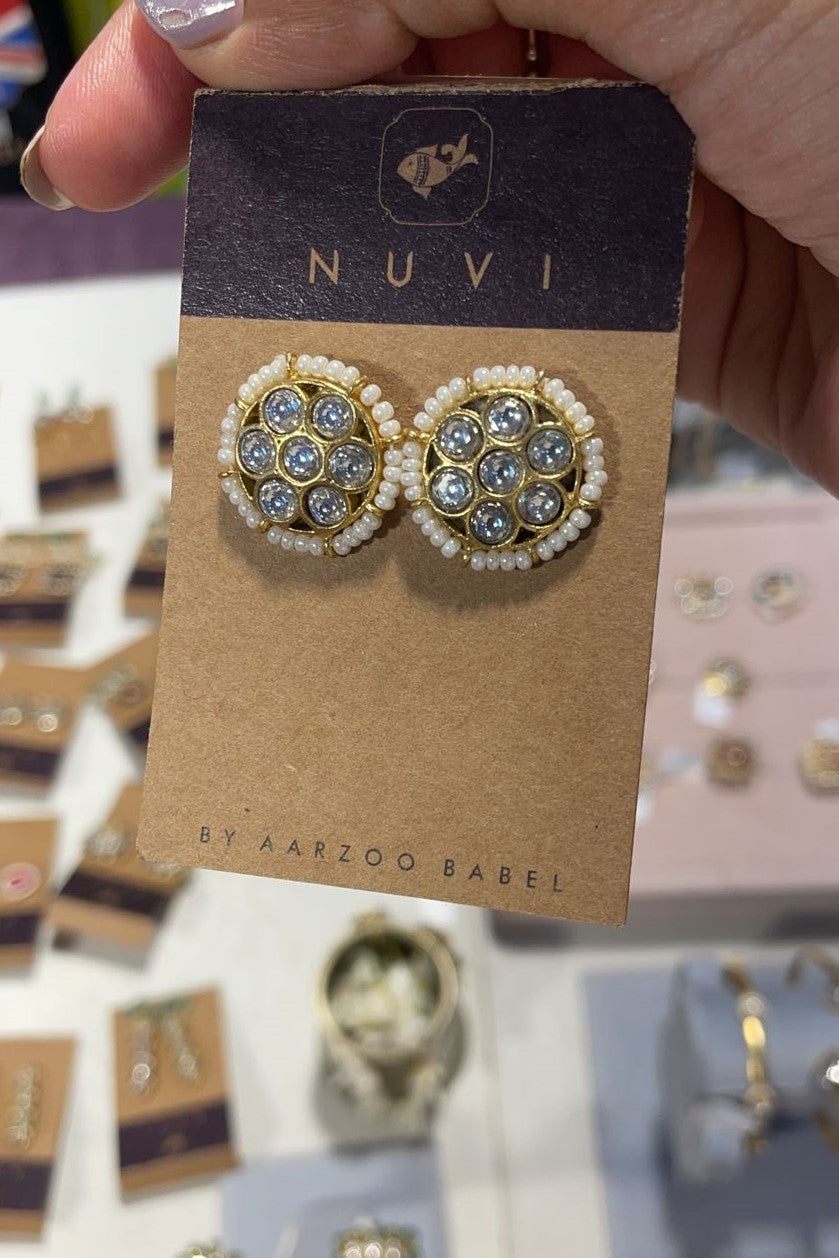 Mogra Earstuds in 925 silver with gold polish, featuring a petite floral design with seven Jadau stones and delicate seed pearl border for festive Indian styling.