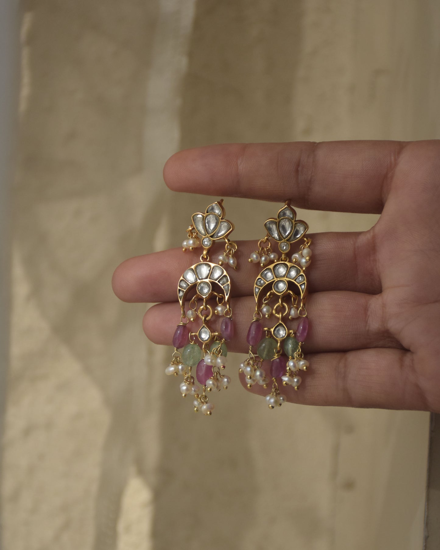 Elegant Chand Fishhoop earrings by Nuvi Jewels in sterling silver with freshwater pearls and multicolor bead accents
