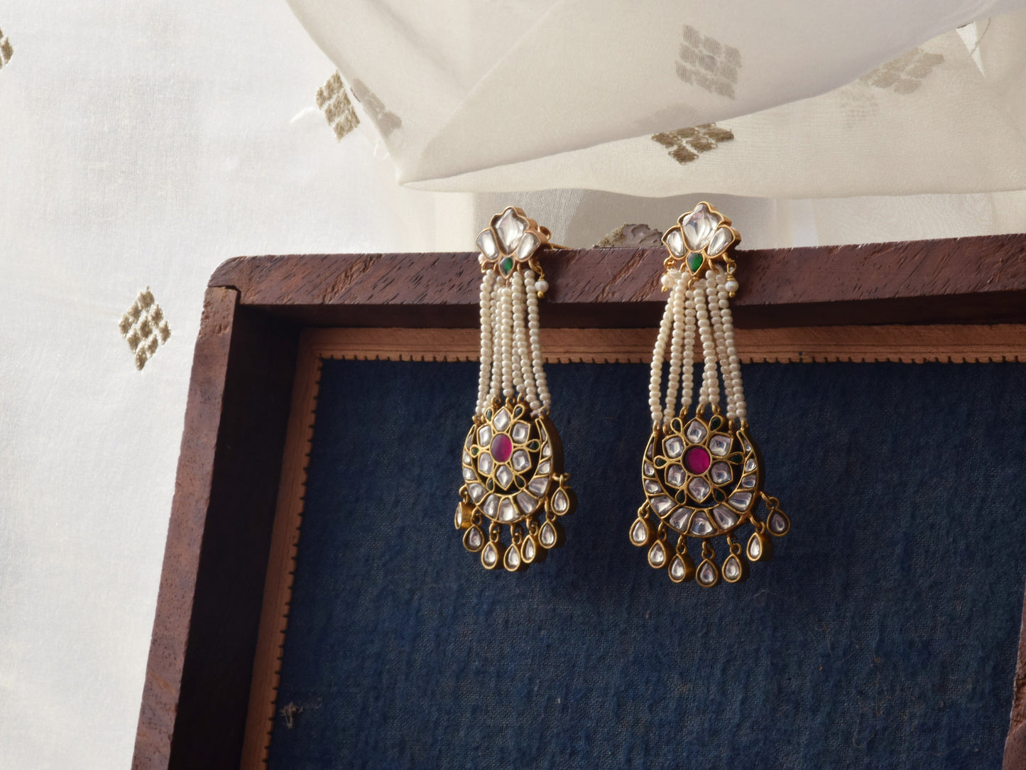 Gold-polished 925 silver earrings with colorful Jadau stones, delicately set for a rich traditional look, ideal for bridal or festive ensembles.