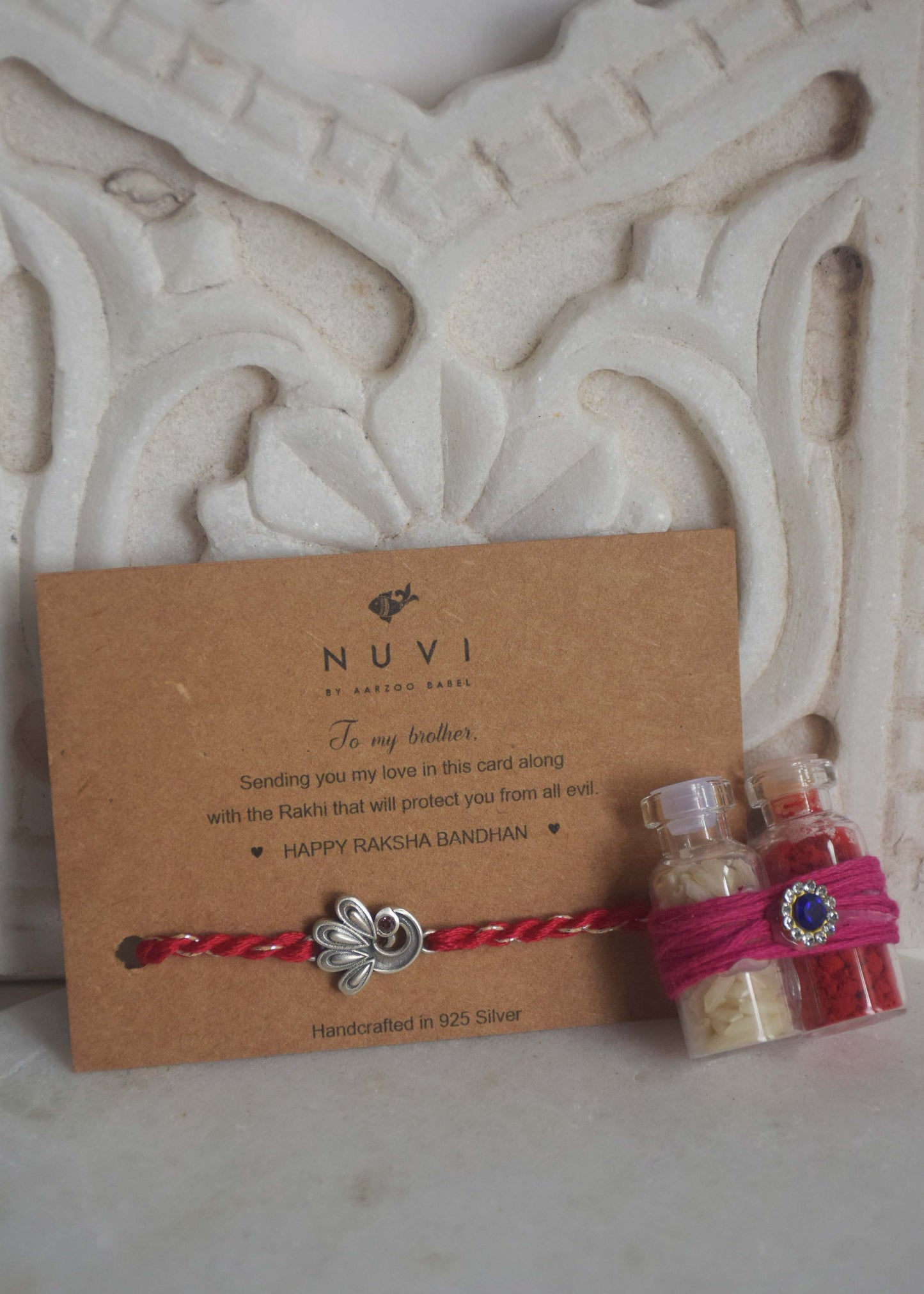 Peacock 925 Silver Rakhi – Handcrafted Detail | NUVI Jewels