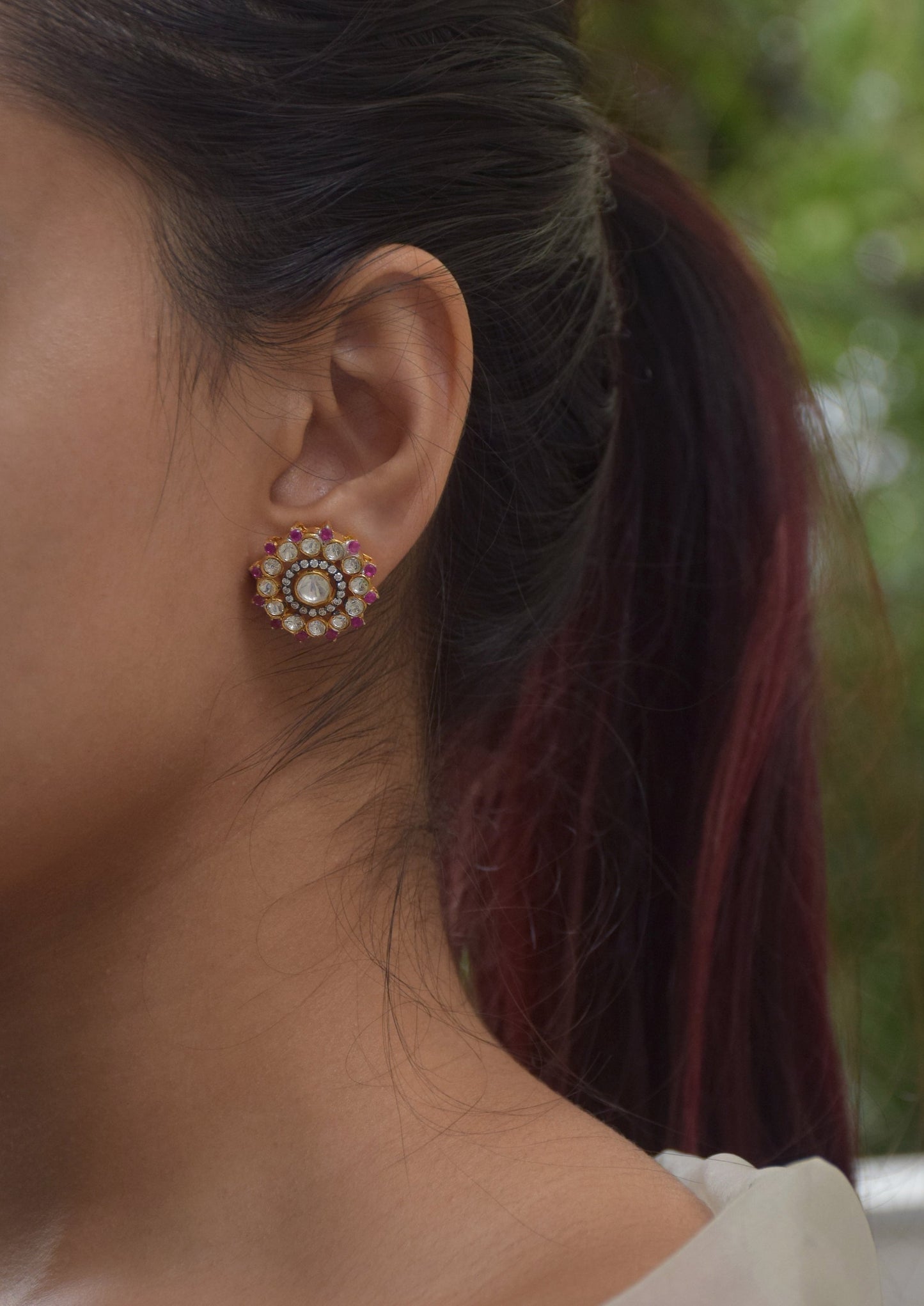 Saanjh 925 silver floral earstuds featuring Polki stones and vibrant pink ad stones.
