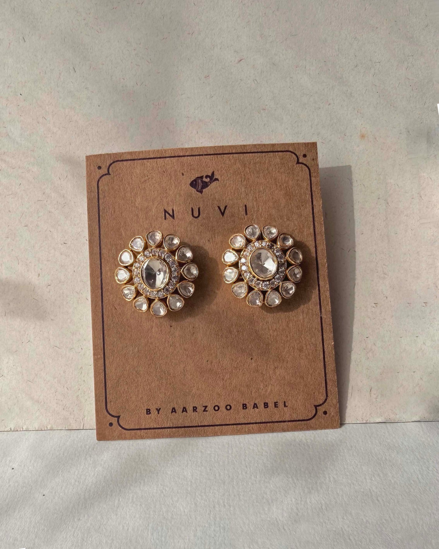 Elegant silver polki ear studs with gold finish inspired by timeless Indian jewelry artistry | NUVI JEWELS