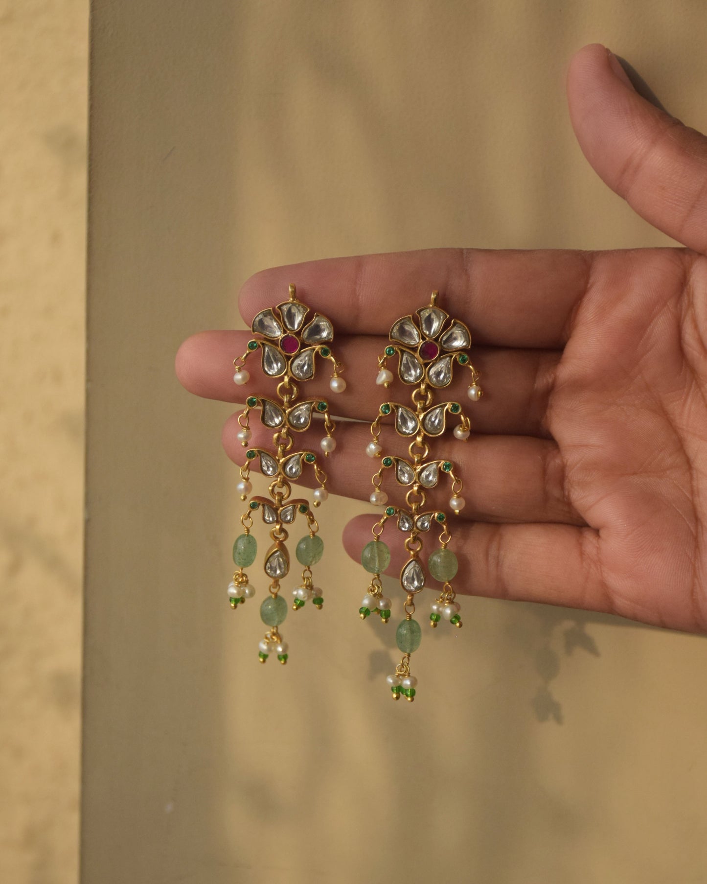 “Handcrafted Nuvi Jewels Vanya Earrings in 92.5 silver with cascading paisley design and elegant craftsmanship