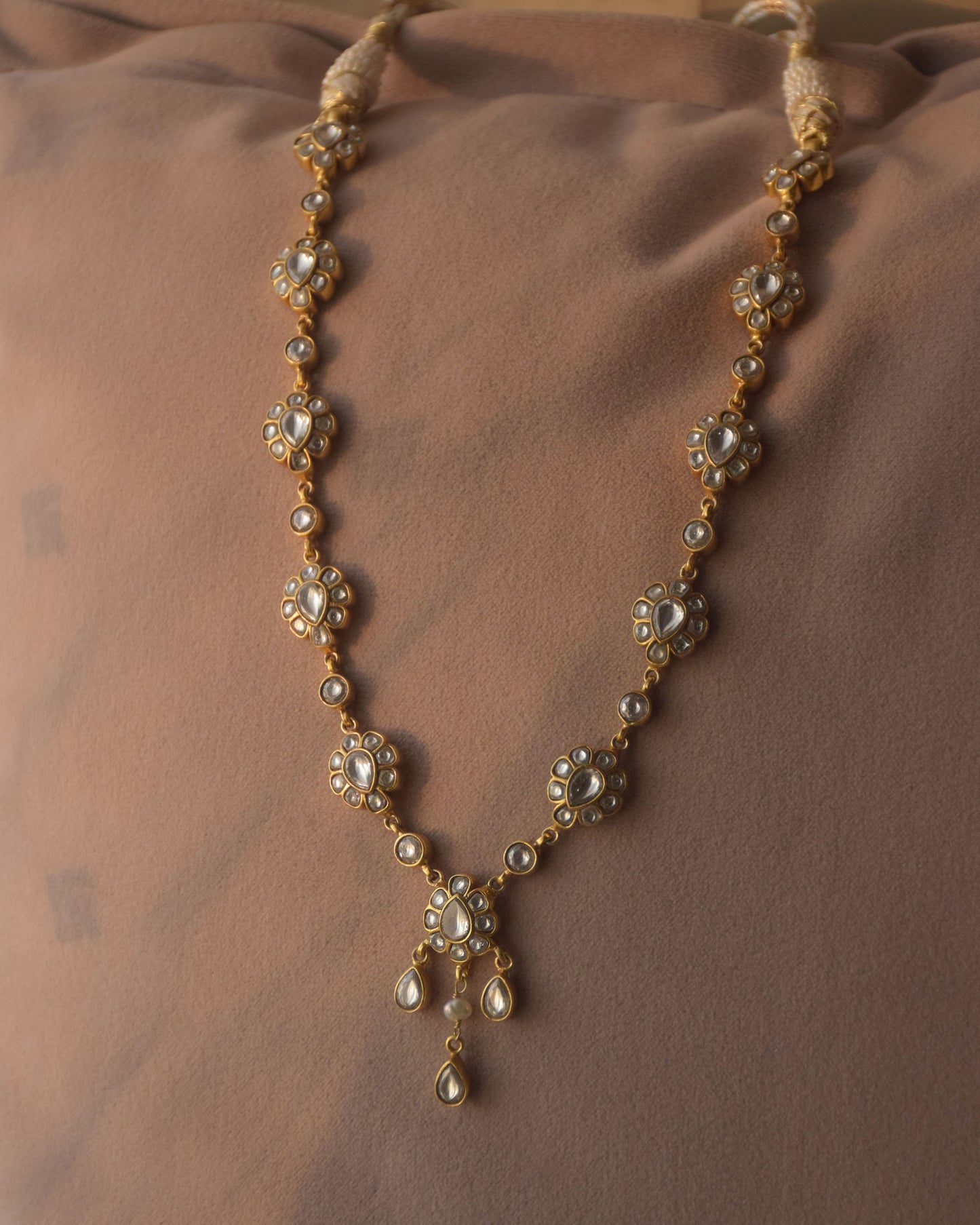 Handcrafted Jadau necklace in 925 sterling silver featuring intricate traditional detailing.