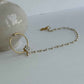 It is composed of 92.5 silver gold plated and has white pearls string with white jadau stones flower.