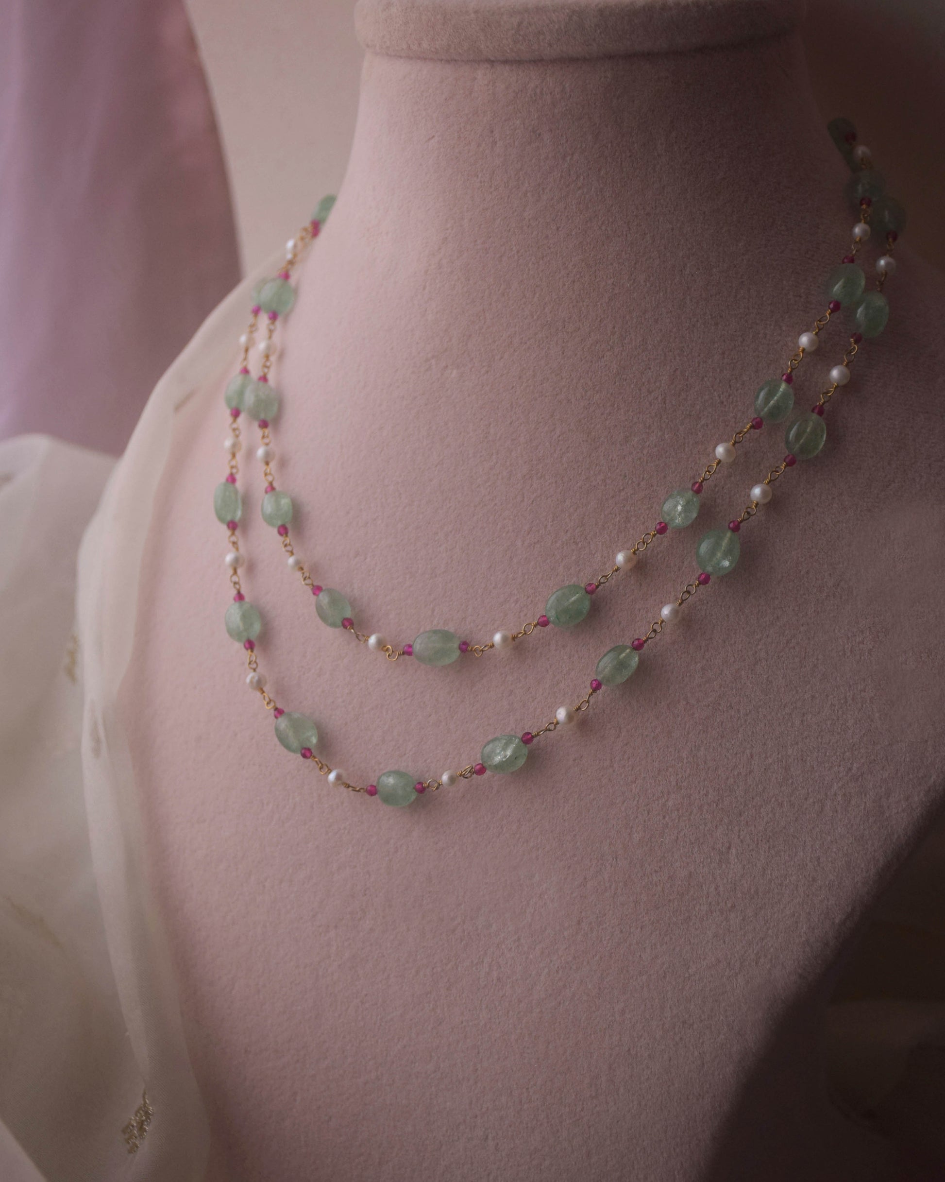 Avantika Mala crafted in 925 sterling silver, featuring two elegant strands of natural green Aventurine beads paired with lustrous freshwater pearls.