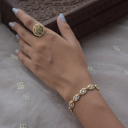 Gajra Bracelet crafted with intricate Jadau stones and delicate pearls, blending traditional Indian floral gajra motifs with modern elegance.