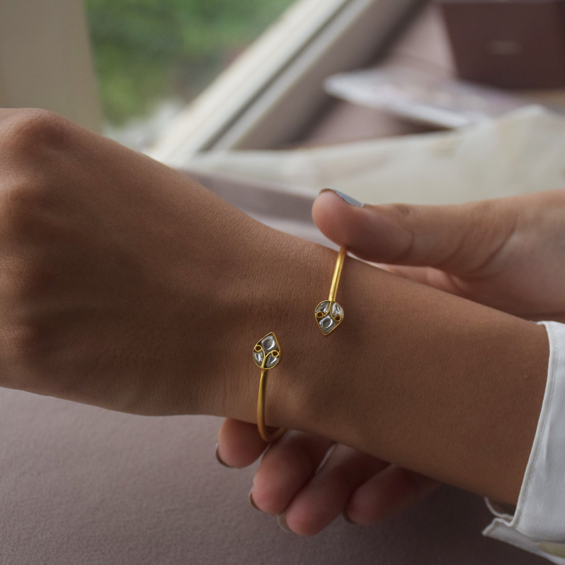 Kali Adjustable Bangle crafted in gold-plated 92.5 silver.