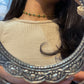  Kamini Choker crafted in 925 silver with 22k gold plating, featuring delicate green aventurine stones surrounded by intricate gold jali work in a floral design.