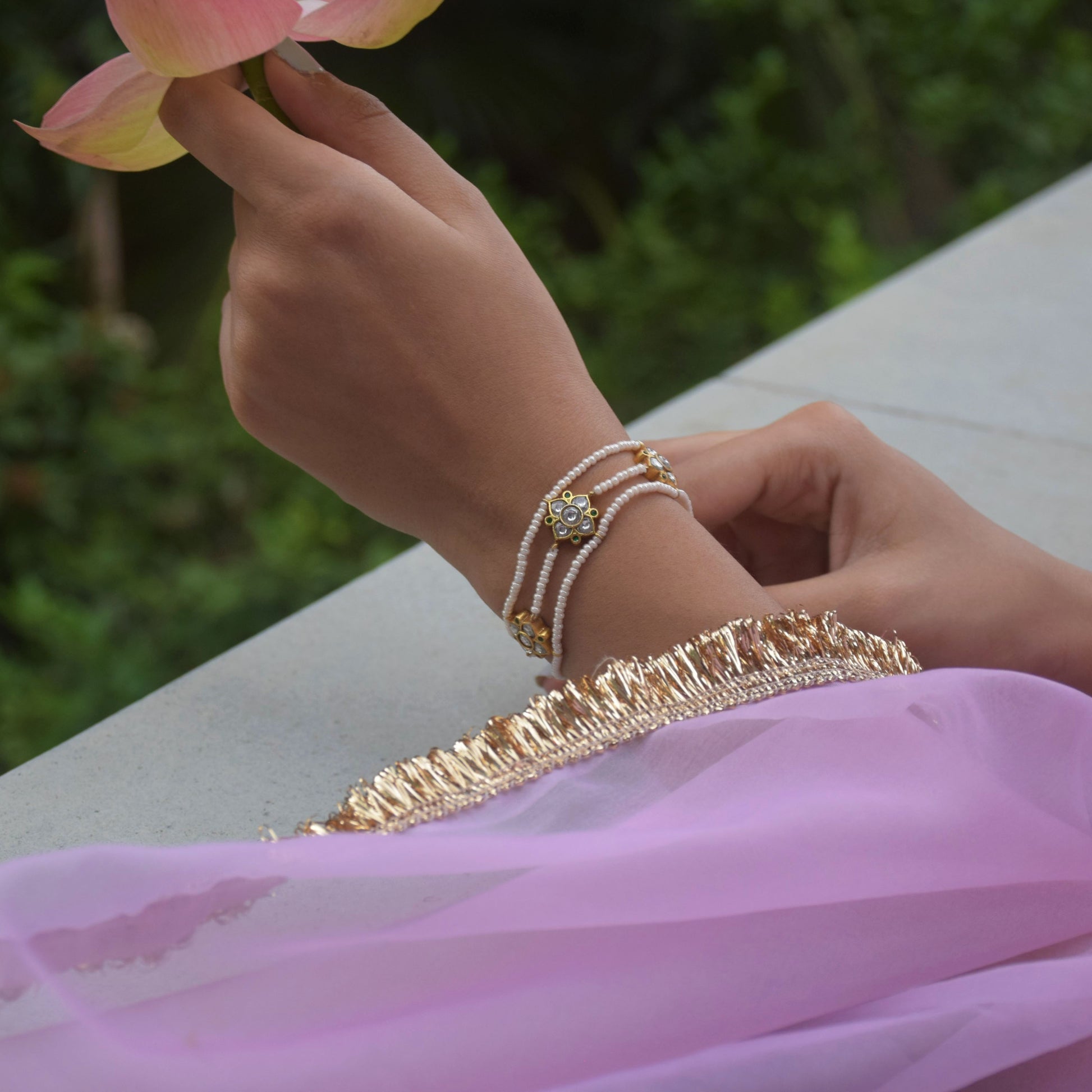 Phillauri Bracelet crafted in 925 silver featuring a beautiful flower unit adorned with intricate Jadau stones.