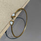 Pyala adjustable bangle crafted in 925 silver with gold plating.