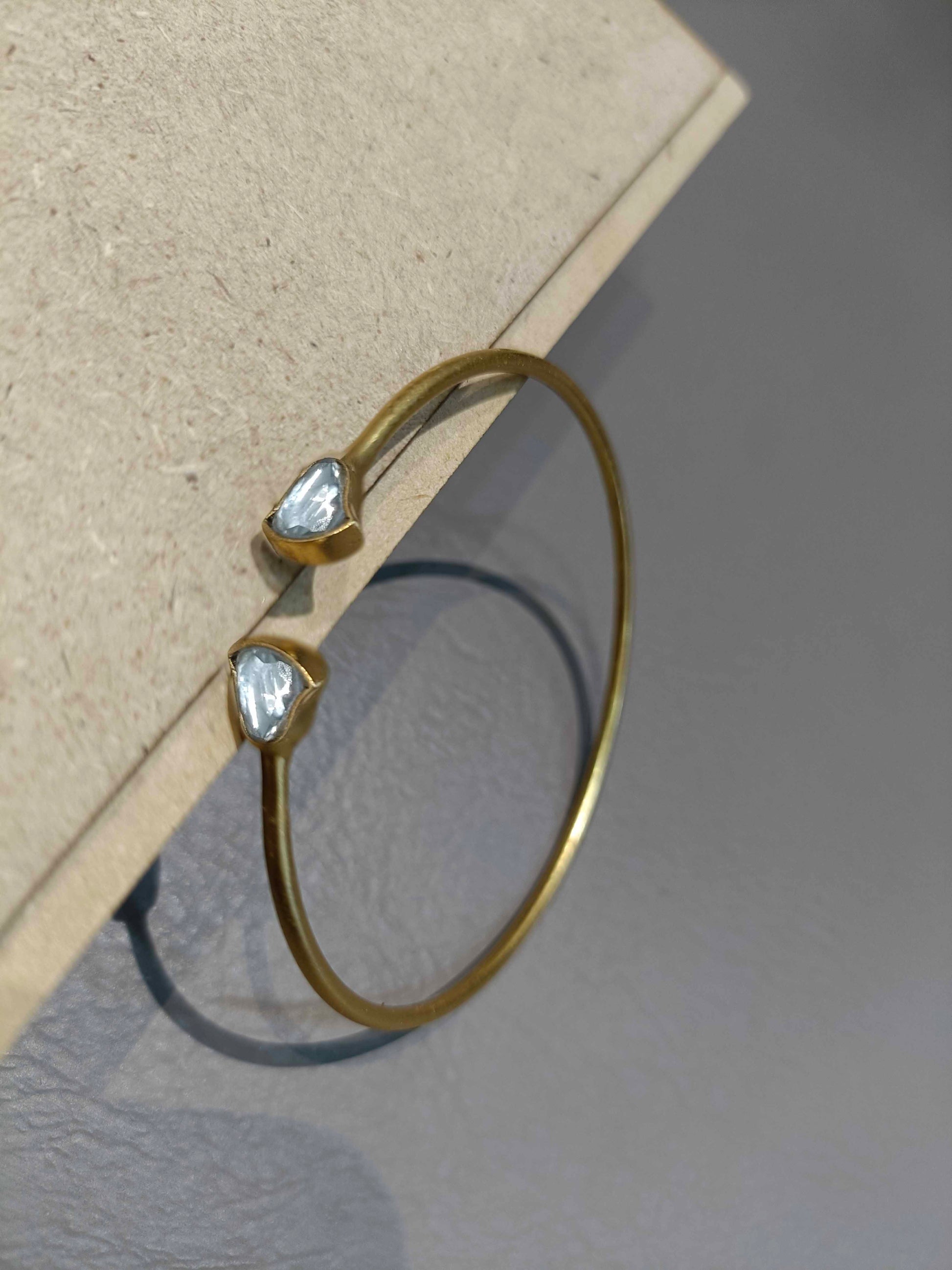 Pyala adjustable bangle crafted in 925 silver with gold plating.