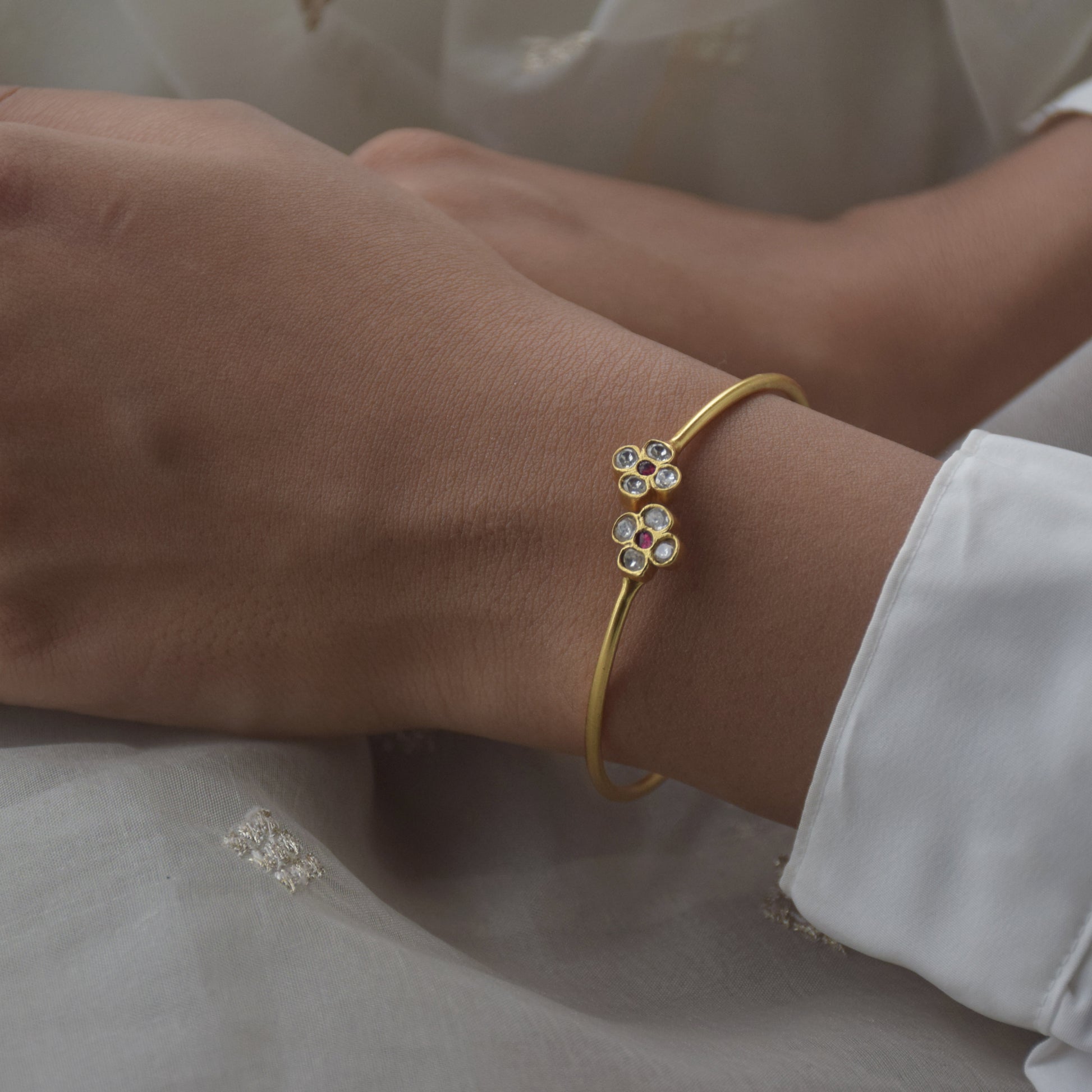 Phool Adjustable Bangle crafted in gold-plated 92.5 silver.