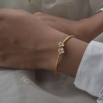 Phool Adjustable Bangle crafted in gold-plated 92.5 silver.
