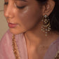 Saadgi Chandbali Earrings crafted in 925 silver, featuring floral studs embellished with Jadau stones connected to intricately designed chand-shaped drops. Finished with hanging clusters of freshwater rice pearls.