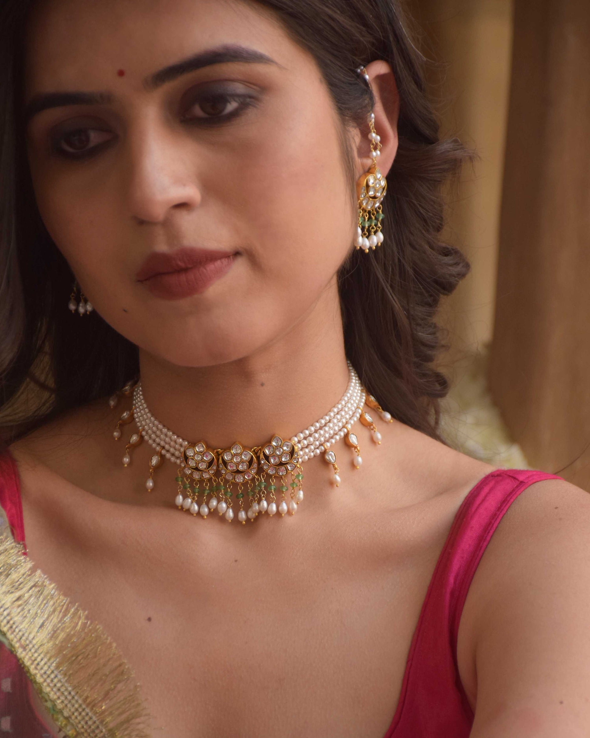 Roop Choker Necklace crafted in 925 silver featuring three classic chaand-phool motifs adorned with hanging rice pearls and green aventurine beads.