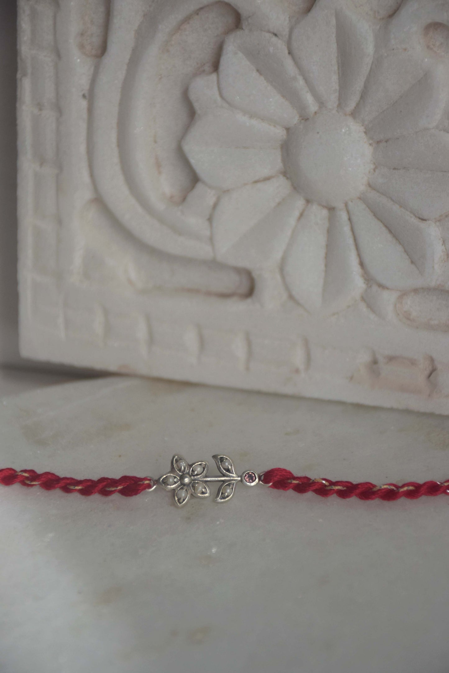 925_Silver_Pearl_Flower_Rakhi_NUVI_Jewels