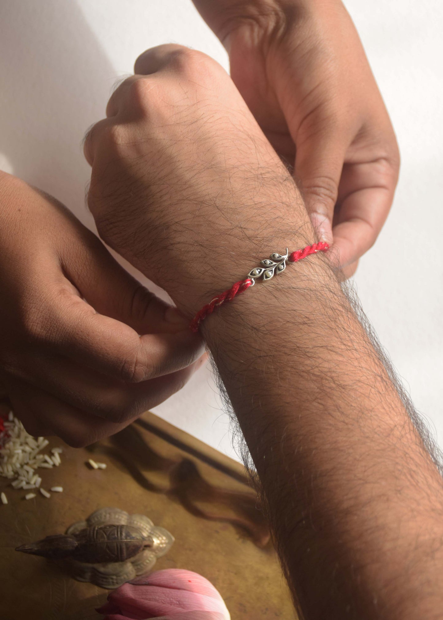 925 Silver Pearl Leaf Rakhi – Handcrafted Chandi Moti Rakhi for Bhaiya Online India | NUVI JEWELS