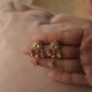 Madhuri earrings are a delicate pair crafted in 92.5 silver, featuring stunning jadau stones. 