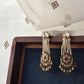 crafted earrings in 92.5 sterling silver, featuring a vibrant array of hand-cut multicolored Jadau stones.