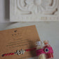  92.5 sterling silver Rakhi featuring real freshwater pearls and cotton thread,