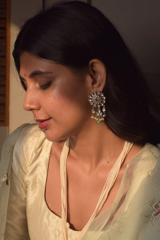 crafted earrings in 92.5 sterling silver, featuring a vibrant array of hand-cut multicolored Jadau stones.