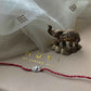 Beautiful 92.5 sterling silver Rakhi crafted with sterling silver and cotton thread
