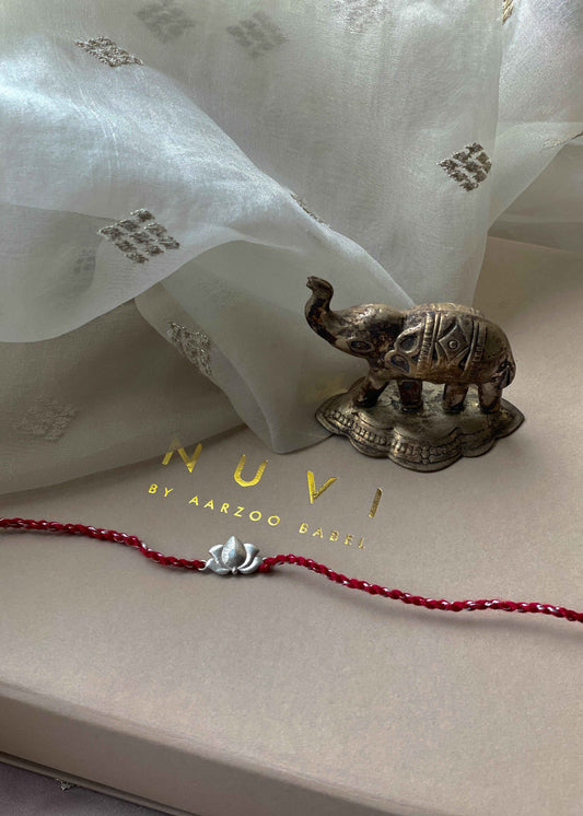 Beautiful 92.5 sterling silver Rakhi crafted with sterling silver and cotton thread