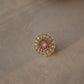 Mannhari RING - Crafted in 925 gold plated Silver has a Round Shape with White & Red Jadau Stones.