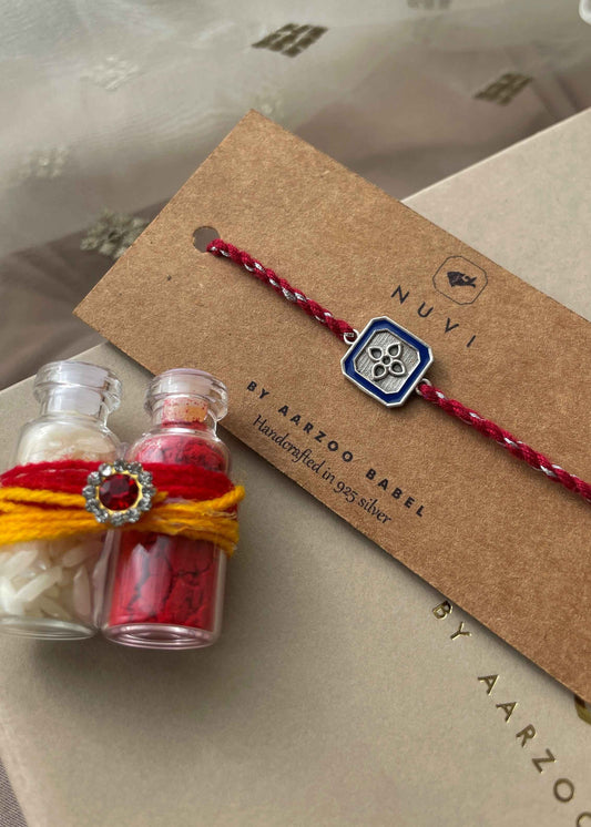 Beautiful 92.5 sterling silver Rakhi crafted with sterling silver and cotton thread