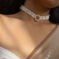 Alt Text:
Pankhudi Choker handcrafted in 925 silver with gold polish, featuring a central petal unit adorned with multicolored jadau stones and delicate pearl accents.