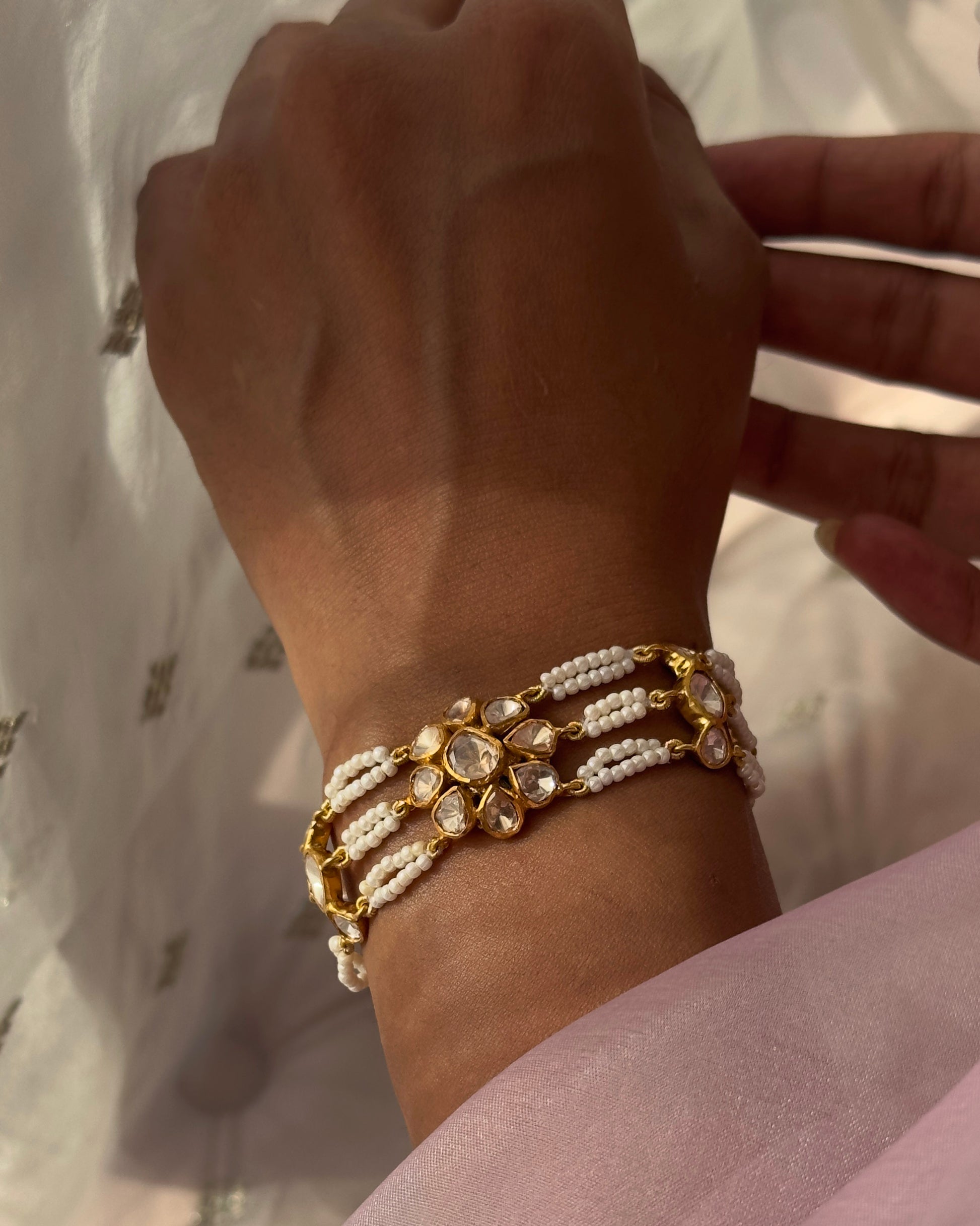 Nuvi Jewels designer bracelet in 92.5 silver featuring moissanite stones and pearls