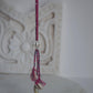  92.5 sterling silver Rakhi featuring real freshwater pearls and cotton thread,