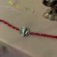 Beautiful 92.5 sterling silver Rakhi crafted with sterling silver and cotton thread.
