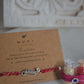 92.5 sterling silver Rakhi adorned with real freshwater pearls and cotton thread.