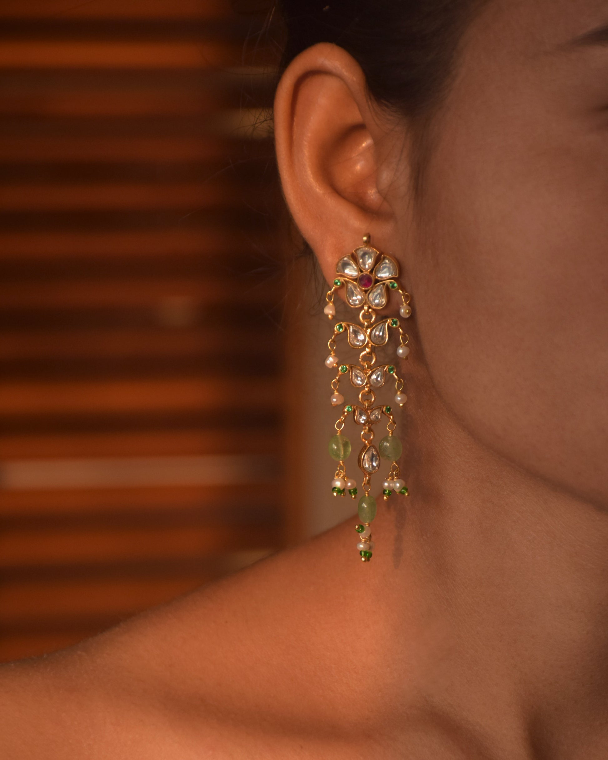 Vanya Earrings crafted in 92.5 sterling silver featuring cascading paisley motifs that exude grace and femininity.