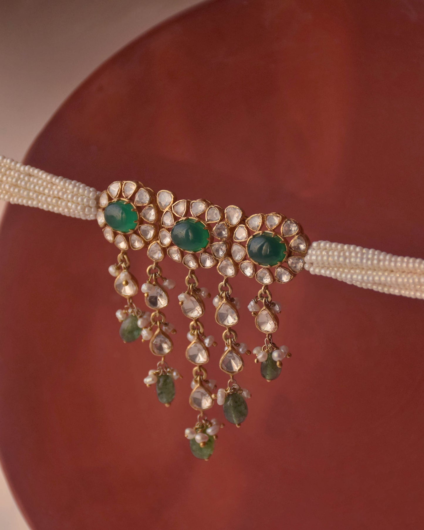 Gold-plated 925 sterling silver Polki drops choker with floral moissanite Polki units, pearl accents, and green aventurine bead dangles.
