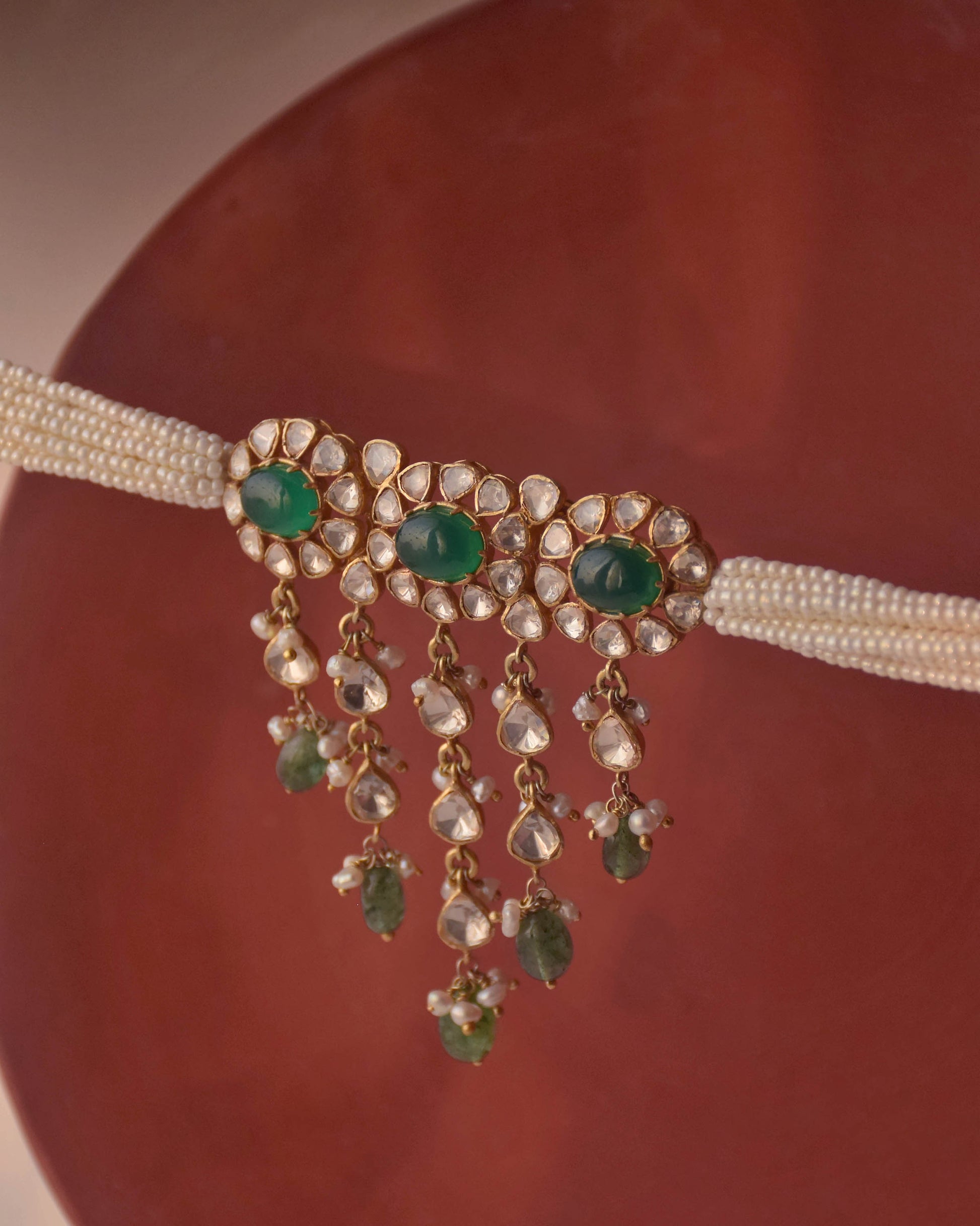 Gold-plated 925 sterling silver Polki drops choker with floral moissanite Polki units, pearl accents, and green aventurine bead dangles.