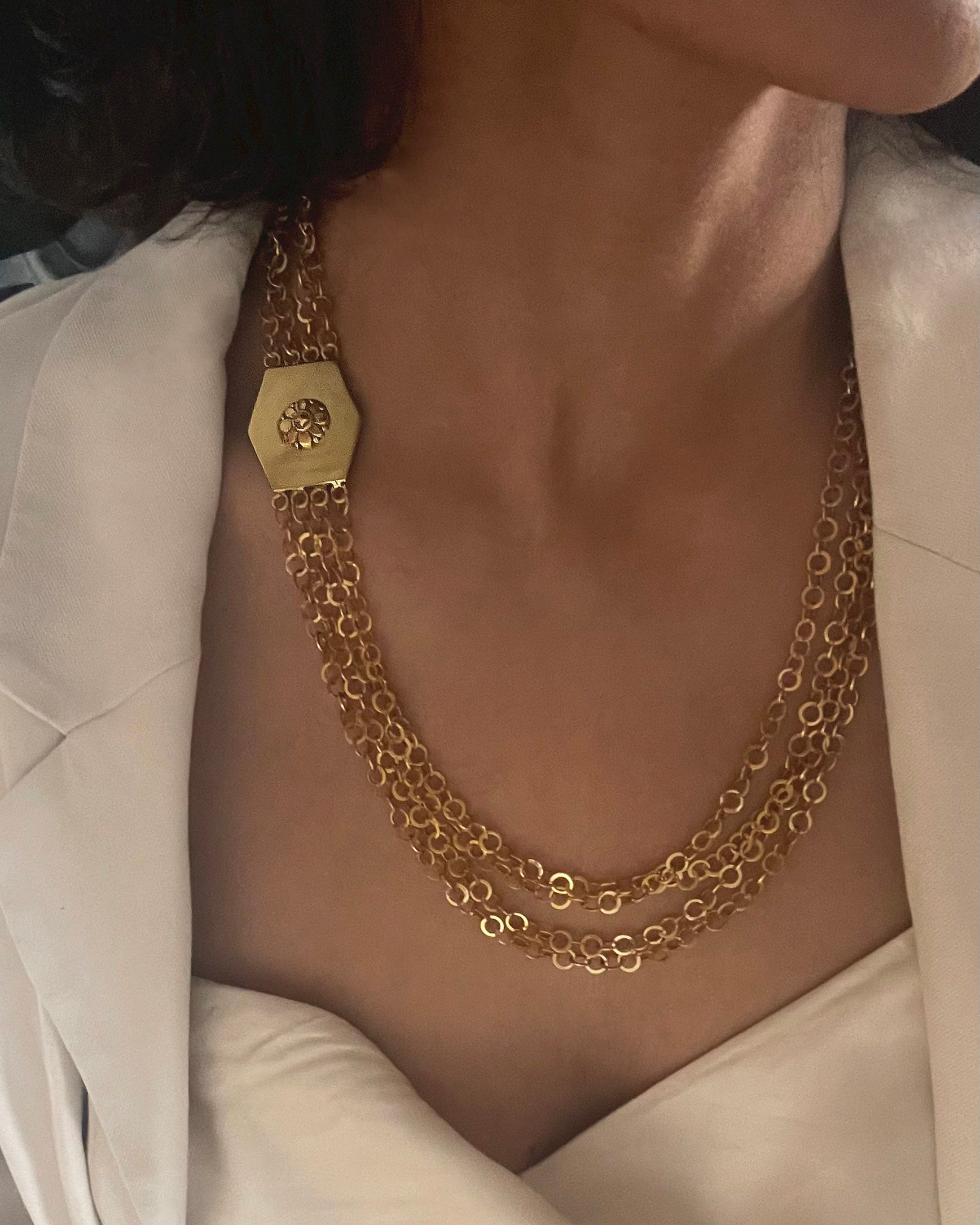Gold-plated 925 sterling silver Chandan Haar necklace with interlinked chains and a bold central motif, combining traditional Indian design with a modern, statement look.
