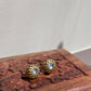 Bindiya 925 silver earstuds with radiant gold finish, featuring a single white Jadau stone and intricate gold wirework.